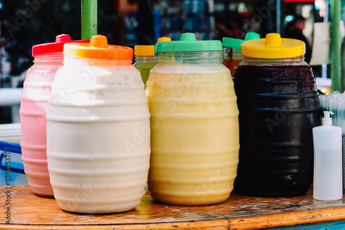 Flavored water with fruit and horchata, traditional beverage in Mexico