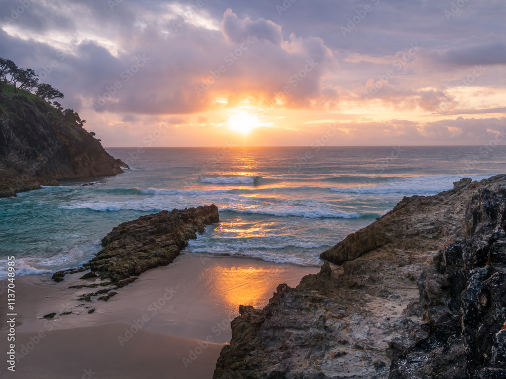 Sunrise Over the Ocean with Rocks Sunrise Over the Ocean with Rocks