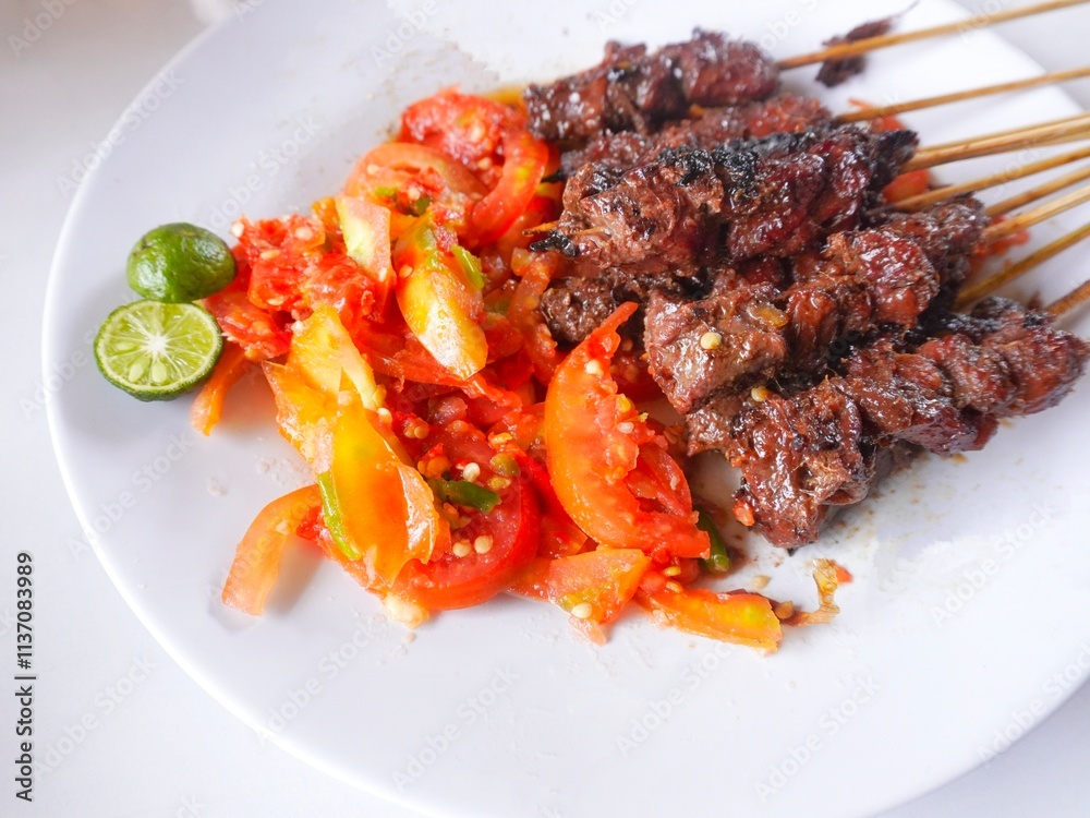 Close up of delicious beef satay called Close up of delicious beef satay called