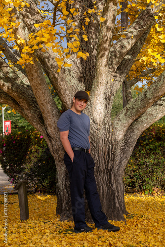 Boy in autumn park