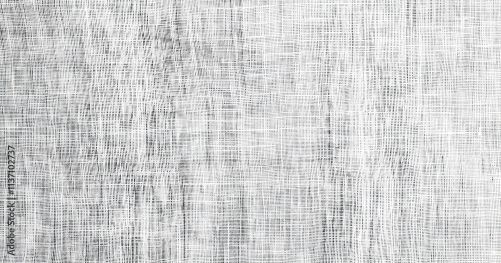 Fototapeta premium A close-up of textured white fabric displaying subtle patterns and variations.