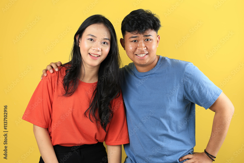 Lovely Young Happy Smiling Asian Couple in T Shirt Clothes Lovely Young Happy Smiling Asian Couple in T Shirt Clothes