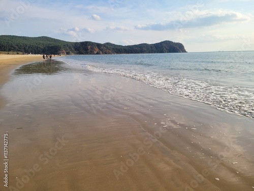 Image of waves crashing at Dadaepo Beach in Busan
 photo