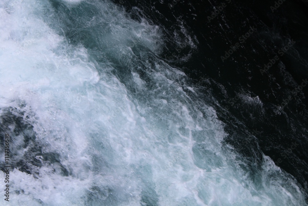 Fototapeta premium water flowing from a waterfall