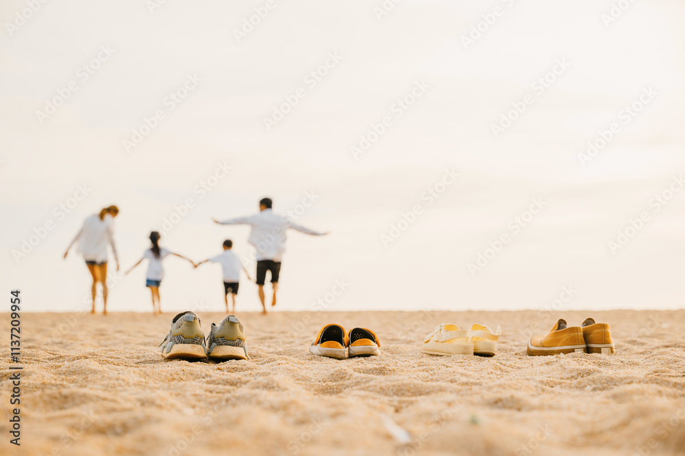 Father, mother and kids take off shoes run on sand beach, Back view of family parents with children fun holding hands together running to beach in holiday, Travel, active lifestyle, Happy family day Father, mother and kids take off shoes run on sand beach, Back view of family parents with children fun holding hands together running to beach in holiday, Travel, active lifestyle, Happy family day