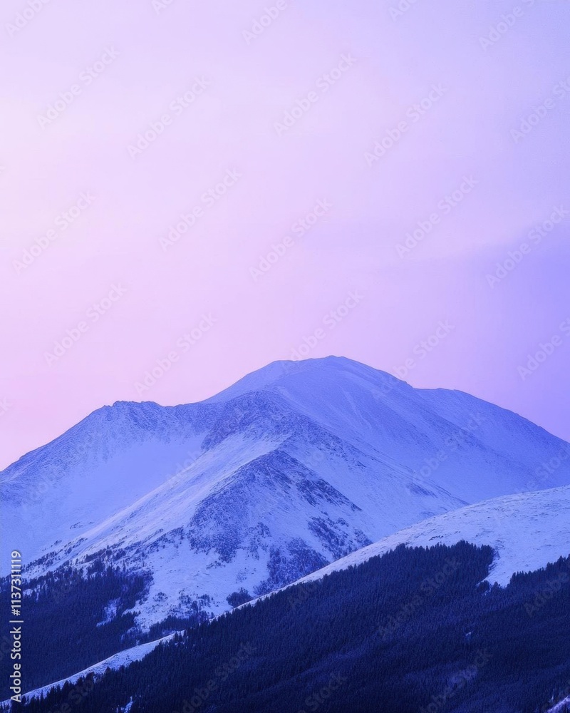 Majestic mountain landscape under a soft purple sky at twilight. Majestic mountain landscape under a soft purple sky at twilight.
