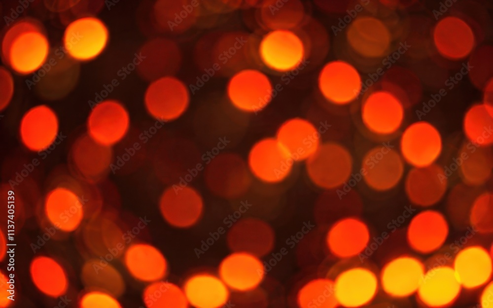 A blurred background of warm orange and red lights creating a festive atmosphere. A blurred background of warm orange and red lights creating a festive atmosphere.