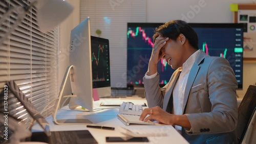 Asian businessman stressed from financial loss, business investment, stock market, online marketing, failed investment concept, economic crisis, loss, failed plan.