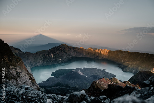 The crater lake of Mount Rinjani on the island of Lombok in Indonesia at sunrise