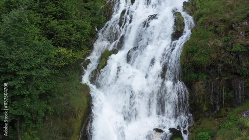 Tranquil Cascades: Summer Falls and Lush Greenery in the Italian Countryside photo