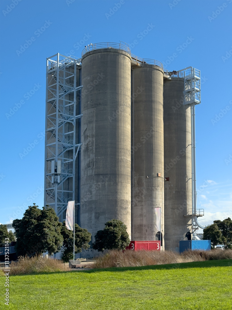 Auckland, New Zealand. Silo Park on the waterfront. Old cement silos that have been repurposed as exhibition and outdoor movie venues. Auckland, New Zealand. Silo Park on the waterfront. Old cement silos that have been repurposed as exhibition and outdoor movie venues.