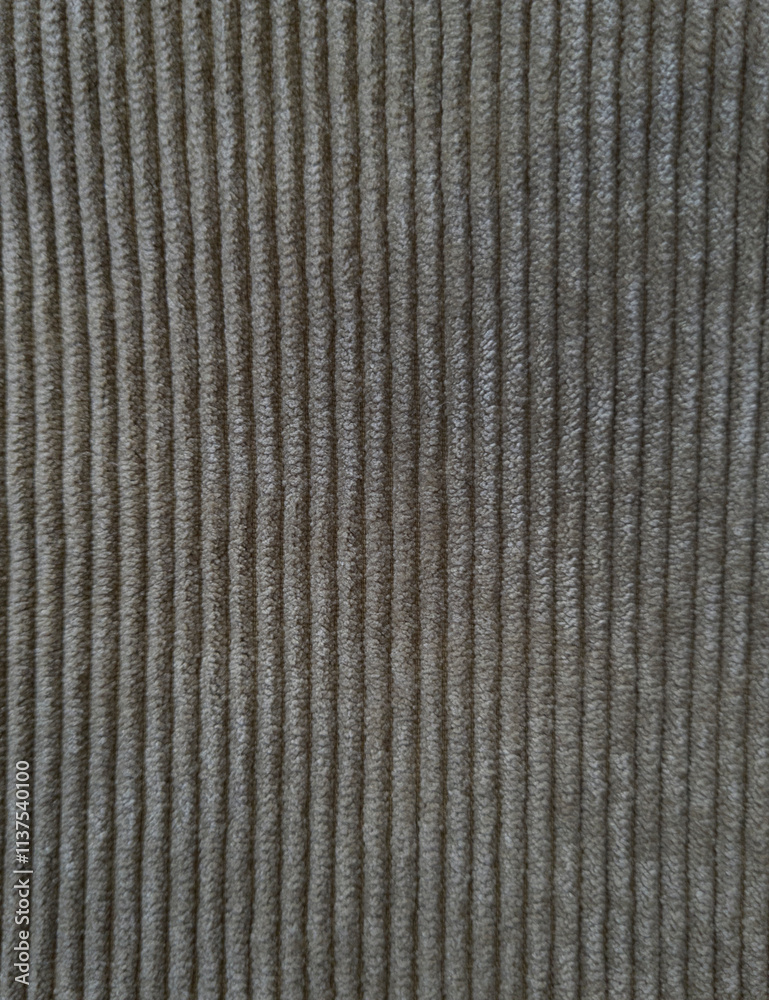 Corduroy fabric photographed close-up, prominent texture, suitable for clothing, bags, gray backgrounds Corduroy fabric photographed close-up, prominent texture, suitable for clothing, bags, gray backgrounds