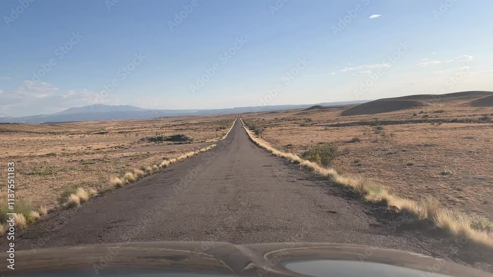 Driving along the empty road of American Southwest Driving along the empty road of American Southwest