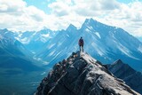 A lone hiker stands on a rocky mountain peak overlooking a vast valley