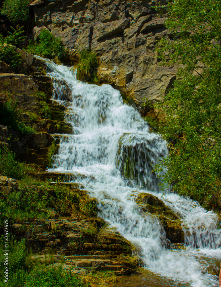 Naklejka premium Small waterfall in the Botanic garden in city Tbilisi, Georgia