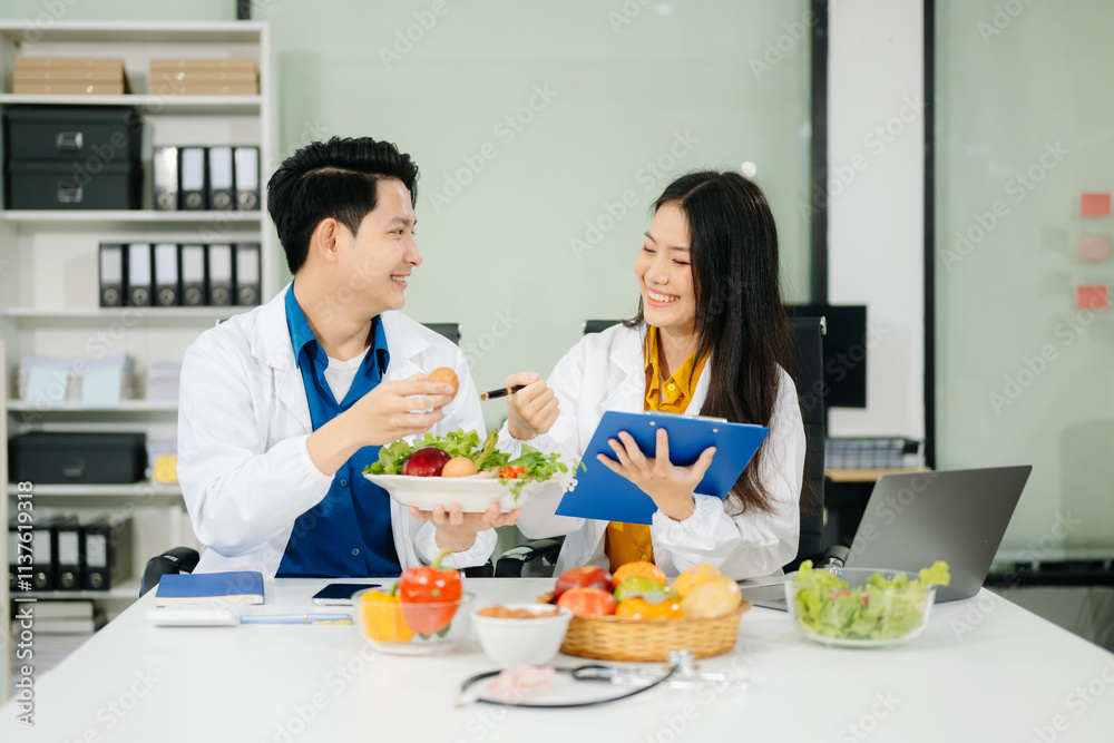 Nutritionists consulting on healthy food choices, meal planning, and wellness concepts Nutritionists consulting on healthy food choices, meal planning, and wellness concepts