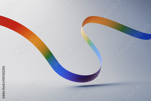 Multi colored ribbon over gray background