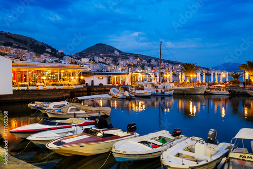 Albania, Vlore County, Saranda, Fishing harbour in the evening photo