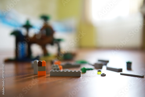 Close-Up of Colorful Building Blocks on Wooden Floor photo