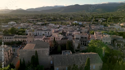 Aerial drone fly at Traditional Houses Landscape of Santa Maria del Cami Mallorca, Spanish sunset mountain background photo