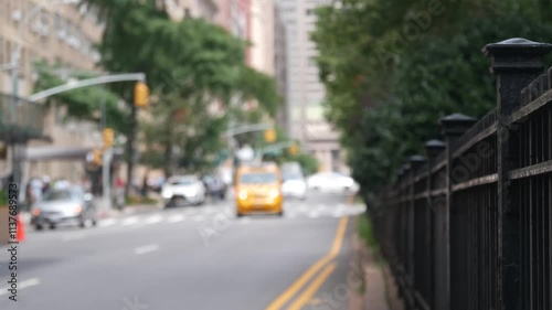 New York City Park Avenue. Grand Central Terminal railway station on 42 street. Manhattan Midtown. Yellow taxi cab in NYC, USA. American urban road car traffic, transport in United States. Defocused.