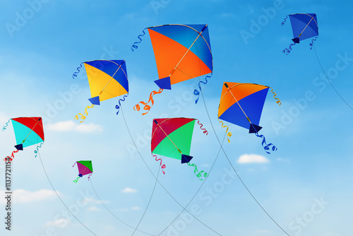 Flying kites with tails and bows. Playing for kids