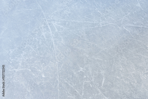 hockey puck and ice on the scratches surface abstract background ice arena photo