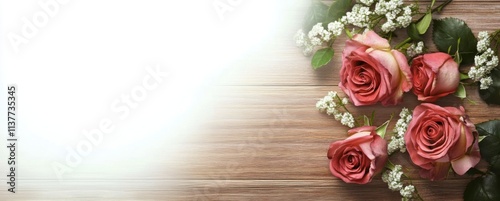 Beautiful rose flowers on wooden background photo