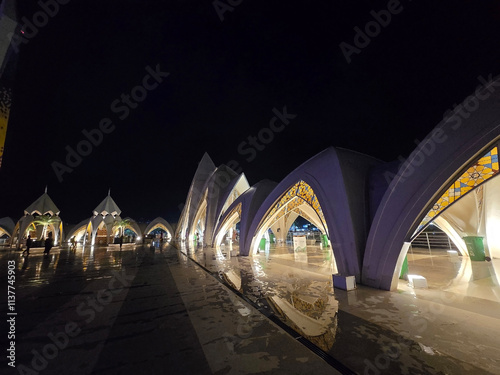 Bandung, West Java, Indonesia, November 30th 2024. The facade of Al Jabbar Mosque in the night. photo