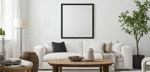 Scandinavian design living room with a black frame, white sofa, and wooden coffee table.