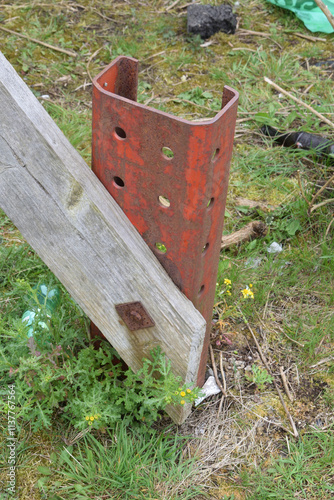 Rusted Metal Post with Timber Beam 