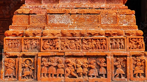Terracotta carvings narrating stories from the Ramayana on the walls of Ram Chandraji's Temple, Brindavan Chandra's Math, Guptipara, Hooghly, West Bengal, India.