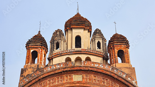 View of the Navratna (nine pinnacles) architecture of Radha Binod Temple, Joydev Kenduli, Birbhum, West Bengal, India. photo