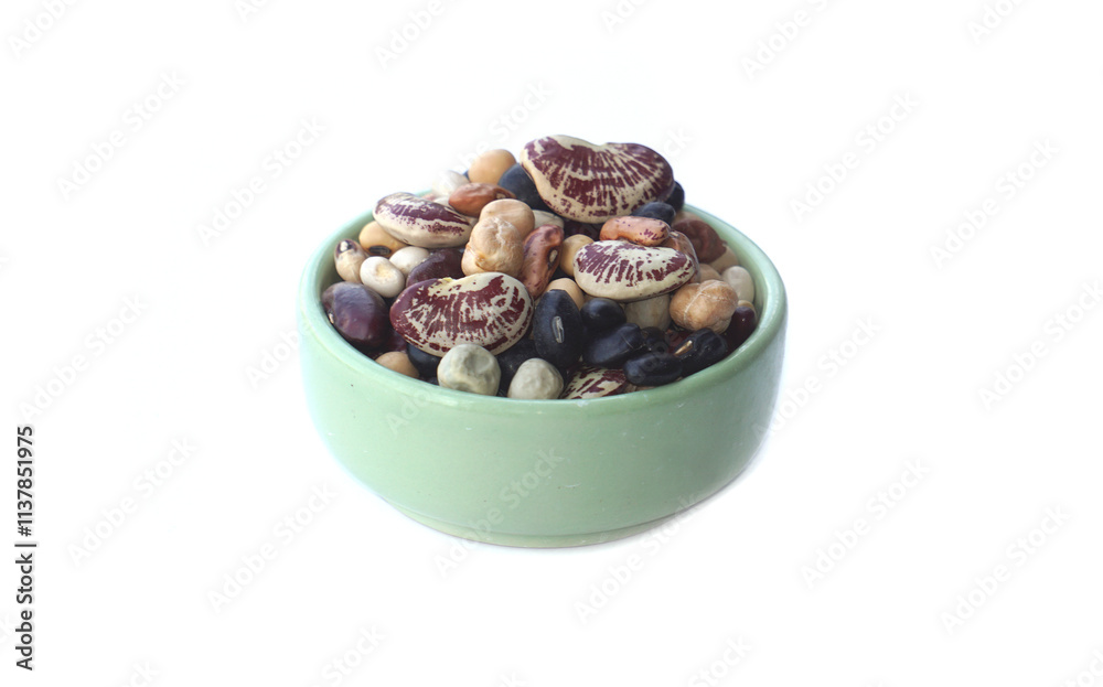 A variety of beans in a cup, such as red, black, black-eyed white, green peas, white peas, peas, tiger, sippeas, azuki beans other. A variety of beans in a cup, such as red, black, black-eyed white, green peas, white peas, peas, tiger, sippeas, azuki beans other.