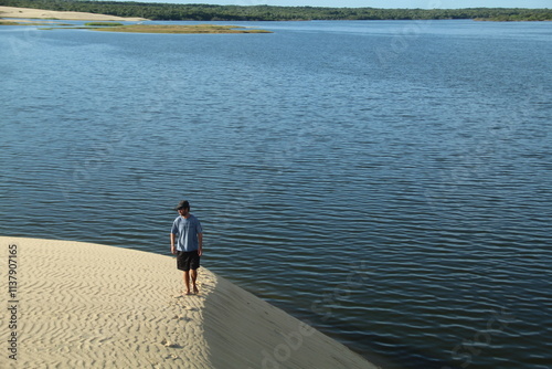 homem na lagoa do portinho em parnaíba, piauí photo