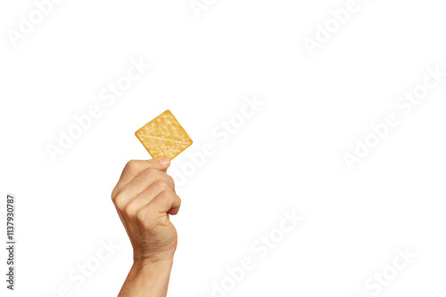 Man hand holding a cracker cookie on a white background