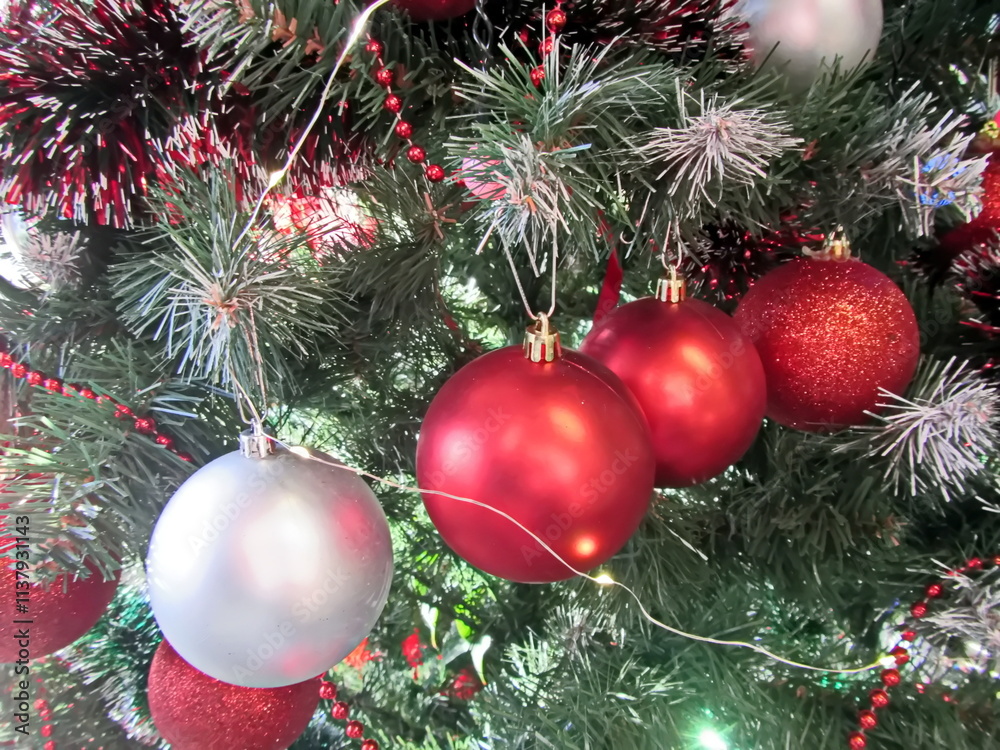 Fototapeta premium Happy New Year.Christmas tree decorations and toys for fir trees covered with snow and ice. Close-up. Merry Christmas.2024.