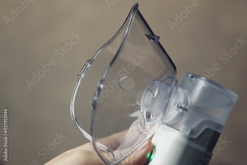 Slika na platnu Portable inhaler in hand close up