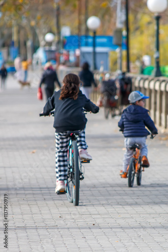 children riding a bike