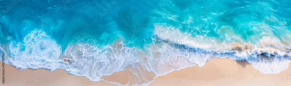 Naklejka premium A beautiful turquoise ocean with soft waves on a sandy beach. Perfect for summer vacation or travel banner backgrounds.