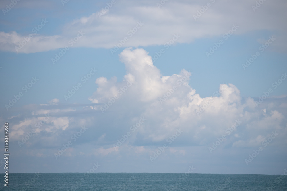 Sky background with clouds. White clouds against a blue sky. Sky background with clouds. White clouds against a blue sky.