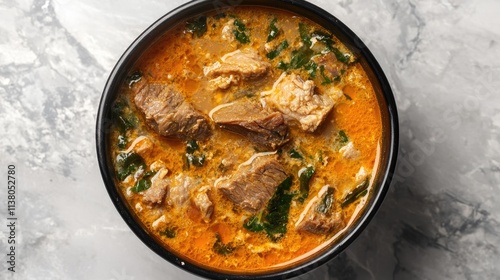 Aromatic Egusi Soup with Dried Fish Beef and Cow Skin in a Bowl Ready to Serve Top View Delicacy of Nigerian Cuisine