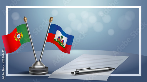Portugal and Haiti National flags on small table with bokeh background, cooperative relationship