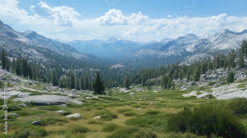 Scenic Mountain Landscape with Lush Green Valley and Majestic Peaks Under Clear Blue Sky