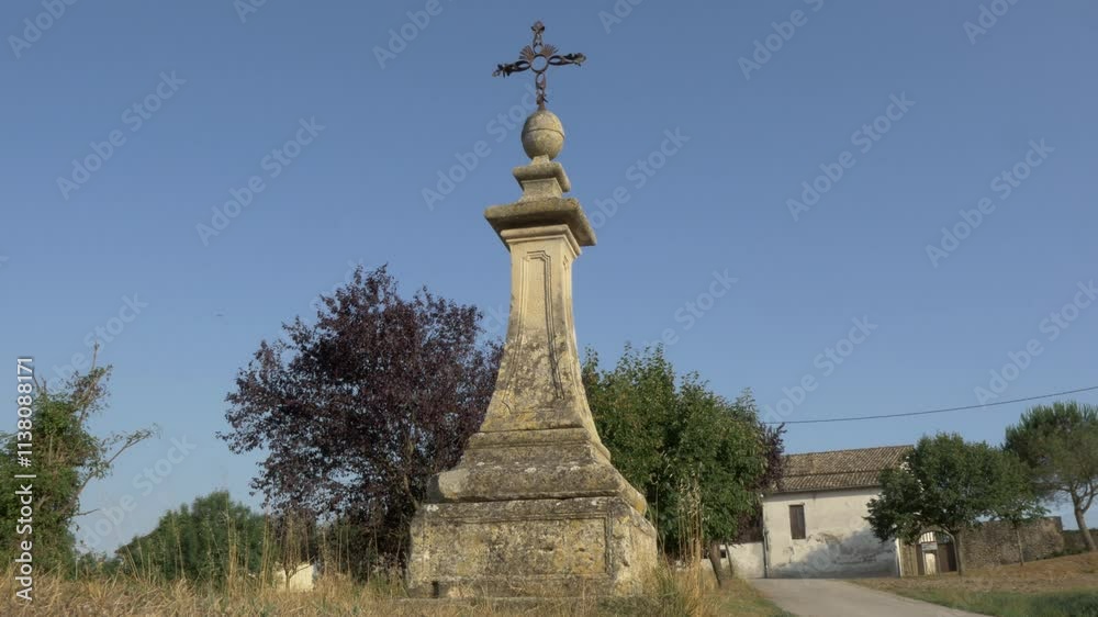 Medieval church with belltower and old building in a village in the mountains of Catalonia Medieval church with belltower and old building in a village in the mountains of Catalonia