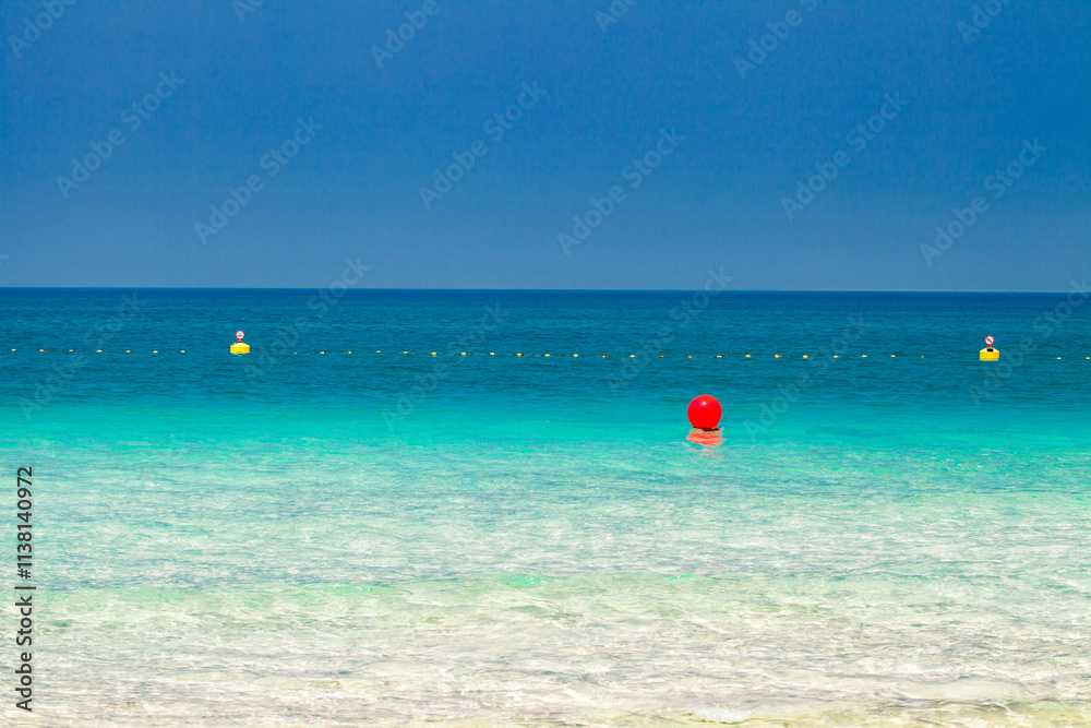 sea coast turquoise water and buoys in water sea coast turquoise water and buoys in water