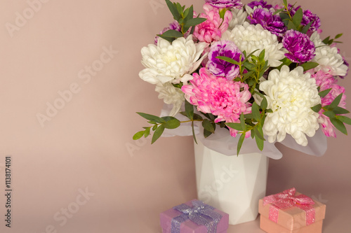 Wallpaper Mural Greeting card for birthday, women's day March 8, Valentine's Day, mother's day or anniversary. Beautiful bouquet of delicate fresh flowers and gift boxes. Empty space for congratulation text Torontodigital.ca