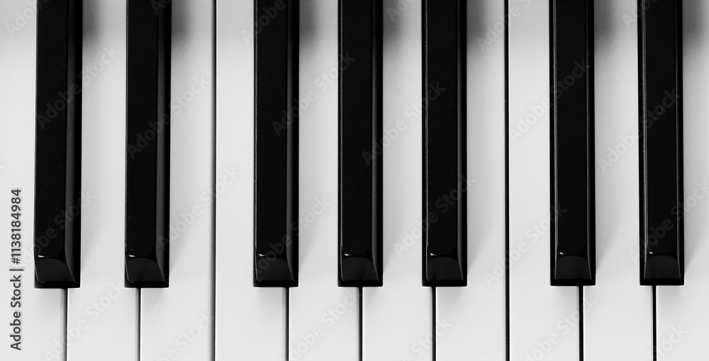 Piano keyboard with black and white keys, top view. Banner design Piano keyboard with black and white keys, top view. Banner design