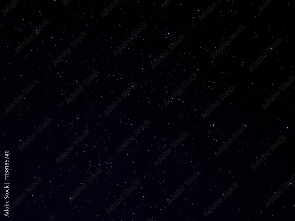 Night sky filled with twinkling stars on a deep black background, tranquil, dark