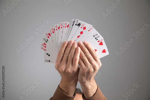 Man showing playing cards. Hobby